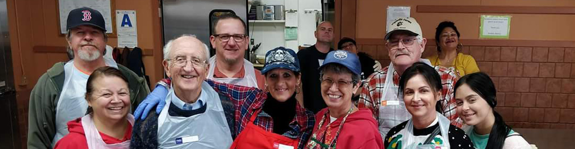 A group photo of people involved in community services in Oceanside