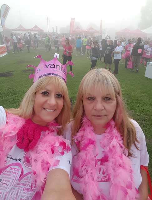 Two women taking a selfie during a Just Believe Foundation event